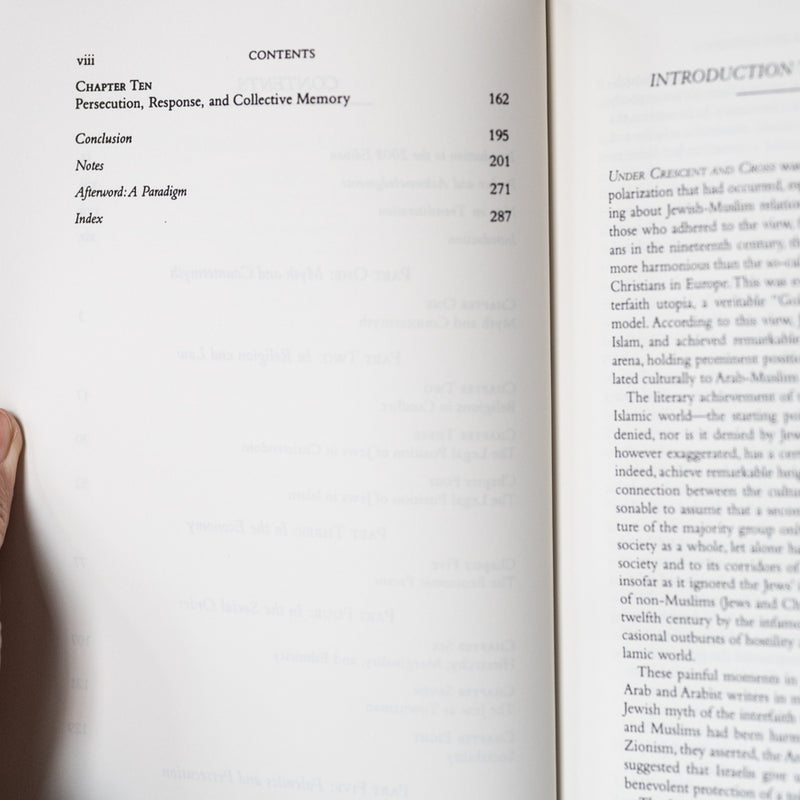 Under Crescent and Cross: The Jews in the Middle Ages