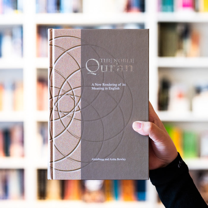 Noble Qur'an: A New Rendering of Its Meaning in English